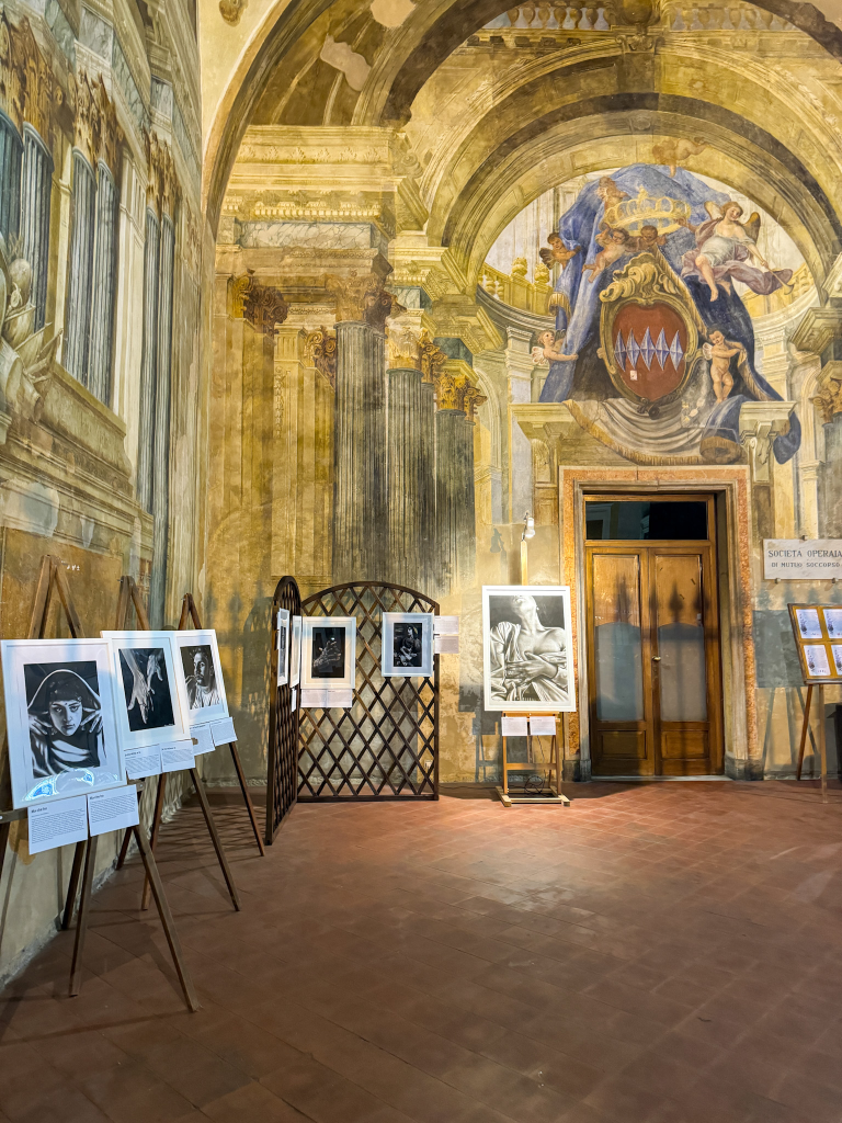 Art gallery display inside a historic church in Sorrento city center