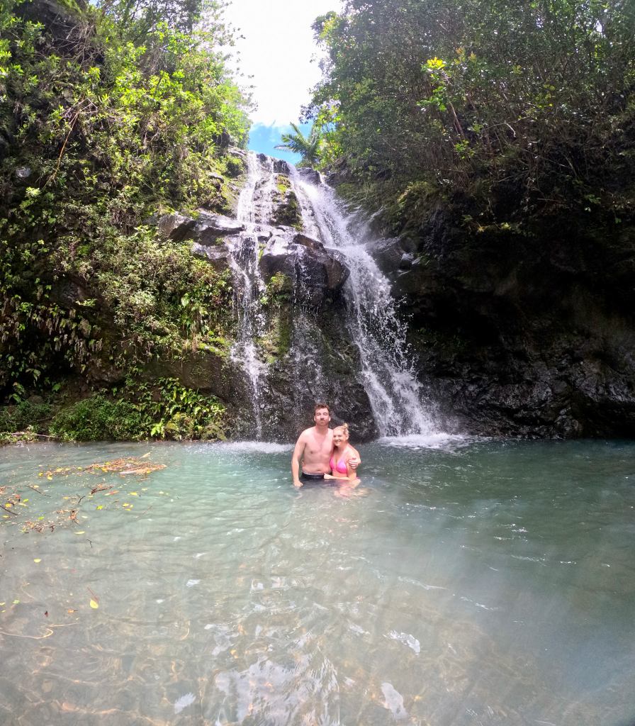 Swimming in the plunge pool beneath Waimano Falls on Oahu