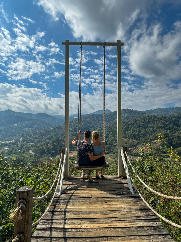 Swing overlooking the mountains and countryside at North Star Valley in Chiang Mai.